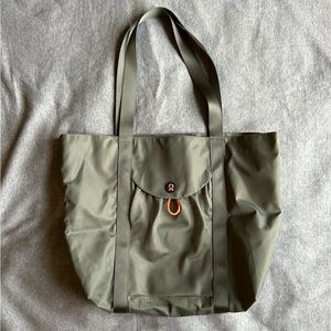 Green Lululemon nylon tote bag with mesh outer pocket
